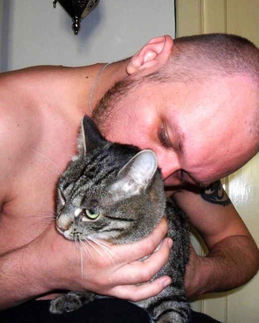 Guy Kissing Cat